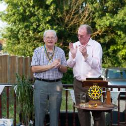 Outgoing President Dave Rosoman welcomes new President Peter Davies